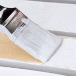 how long before painting pressurized wood